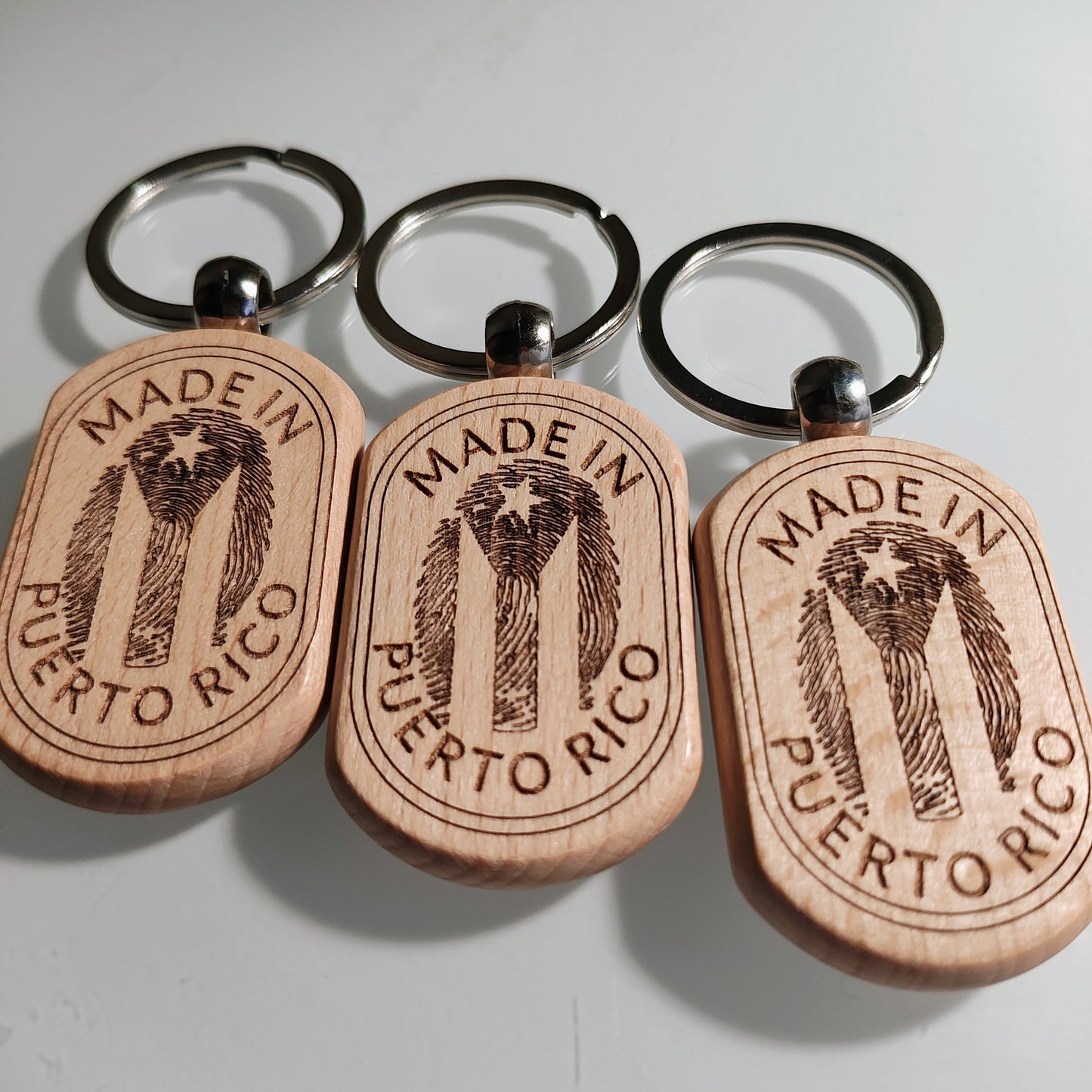 Custom-Made Puerto Rican fingerprint Keychains.